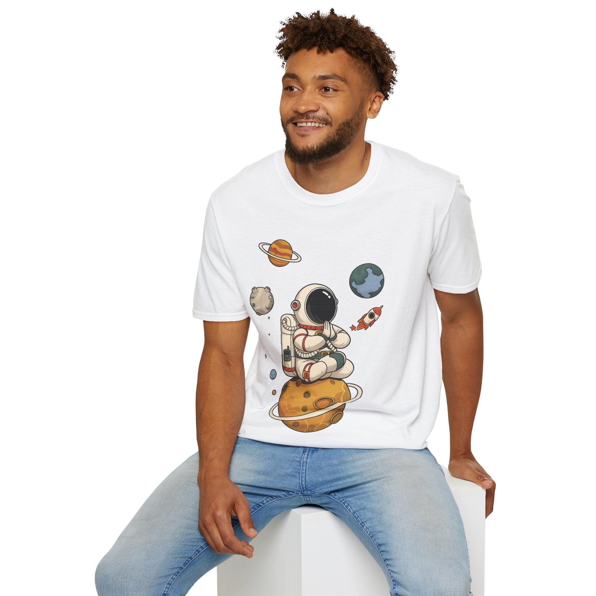 Astronaut Sitting on Planet T-Shirt — Cute Space Explorer Tee